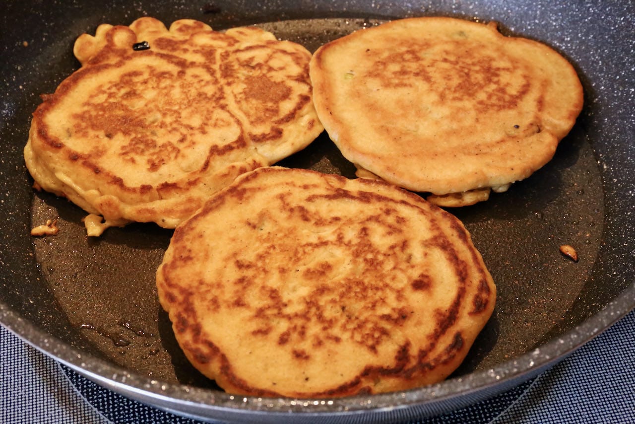Cook Indian Pancakes in a greased nonstick skillet until crispy and browned on both sides.