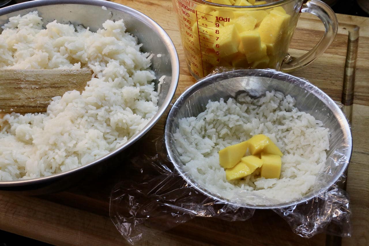 Glutinous Rice Balls with fresh mango chunks assembly.