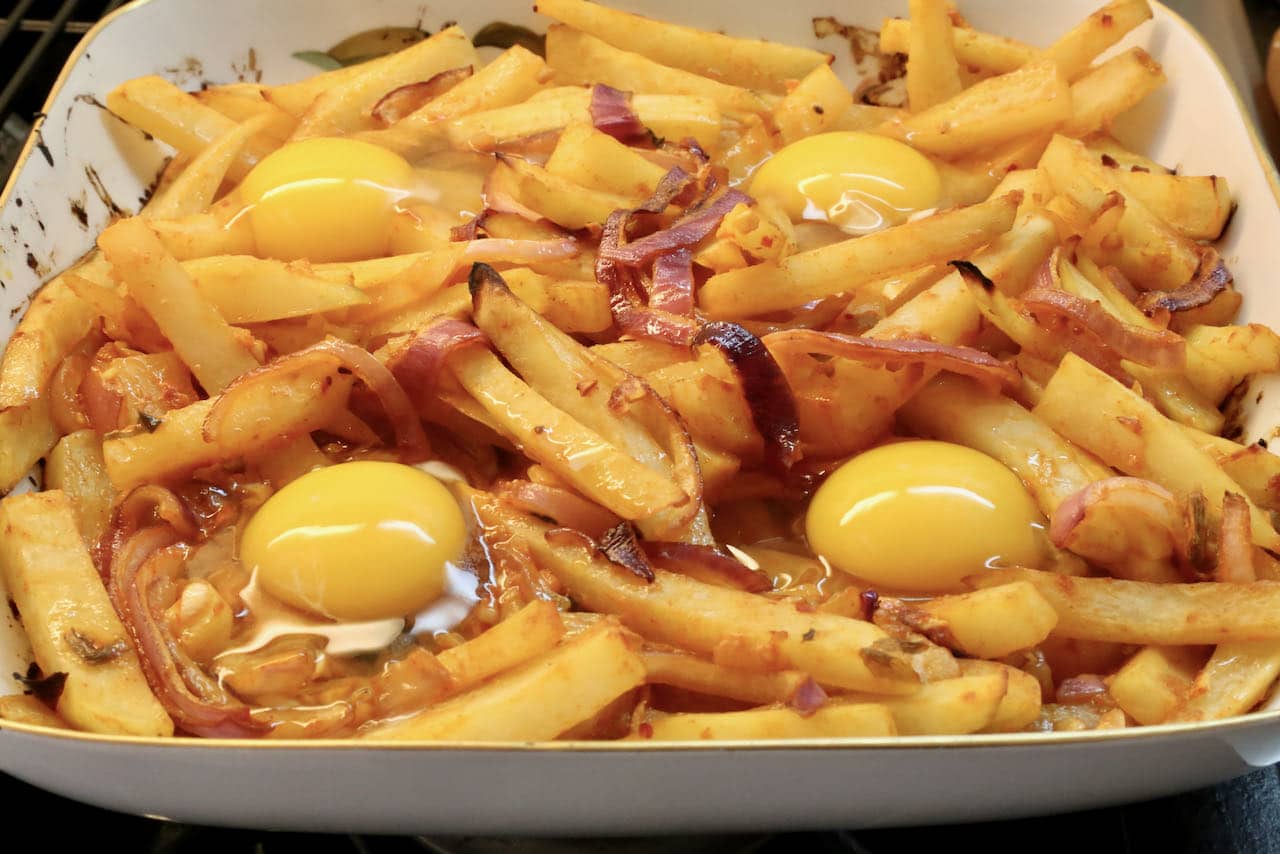 Crack eggs into Gochujang Potato casserole dish and bake in the oven.