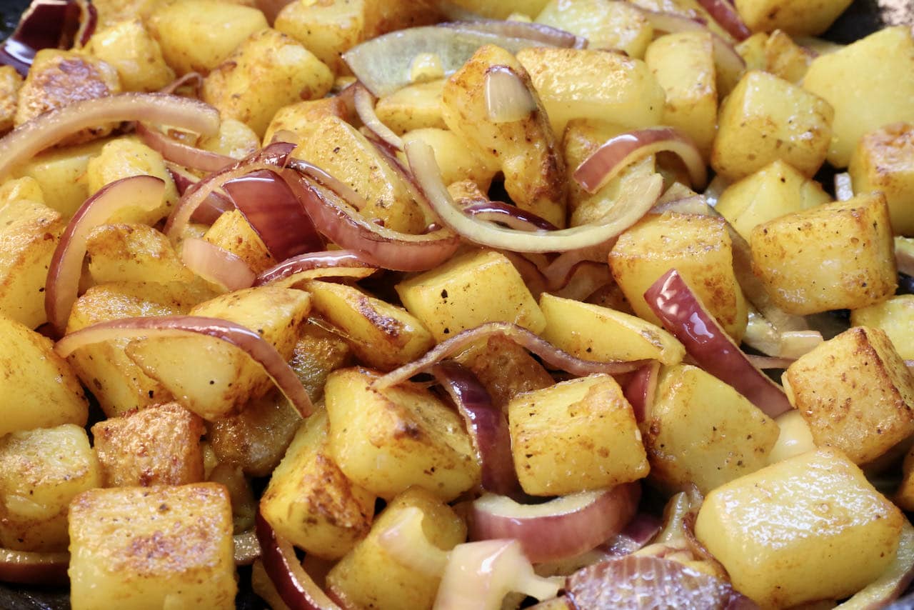 Our homemade Aloo Fry recipe features crispy potatoes and tender onions. 