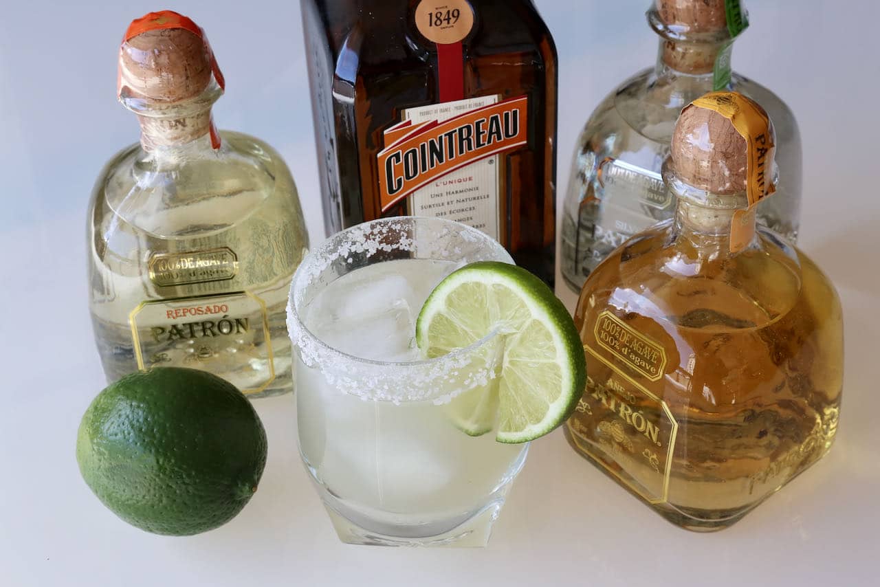 Serve our refreshing homemade Patron Margarita recipe with a salt rim and lime wheel.
