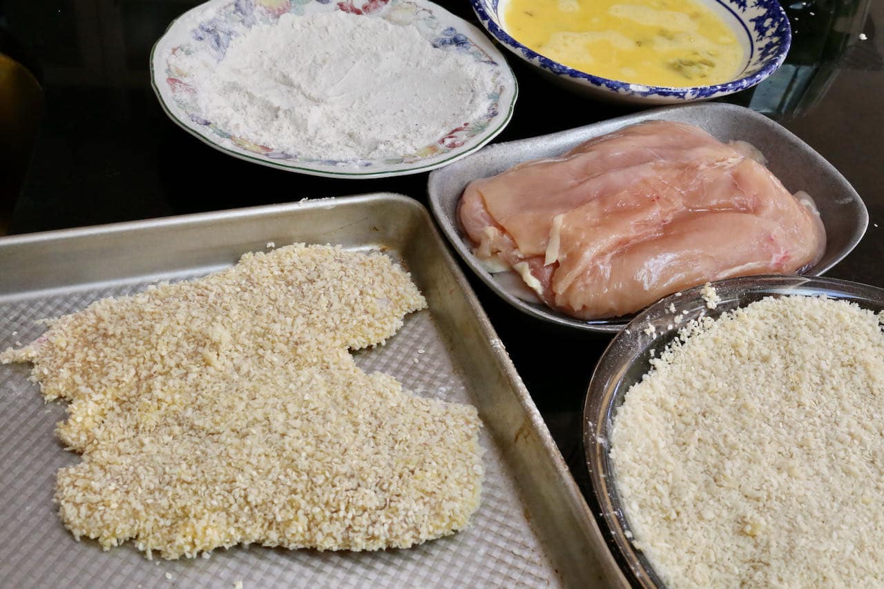 Prepare Chicken Schnitzel by dunking breasts in flour, beaten egg and panko crumbs.