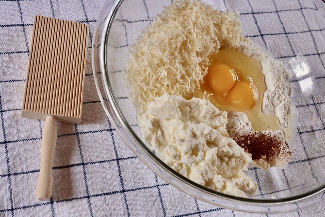 Mix Ndunderi ingredients in a large mixing bowl until you form a soft dough. 