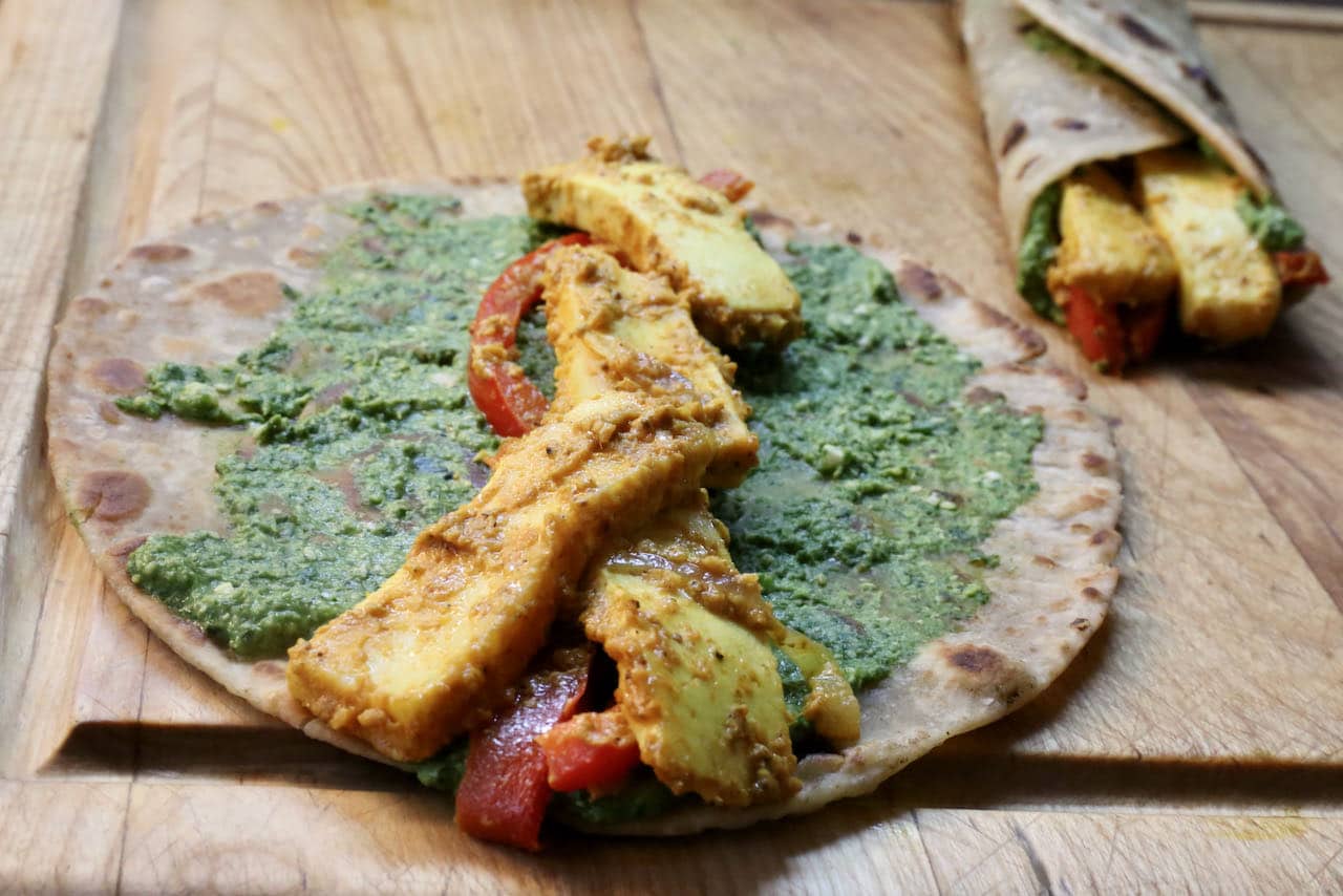 Paneer Roll: Slather paratha with herb chutney and fill with sauteed vegetables. 