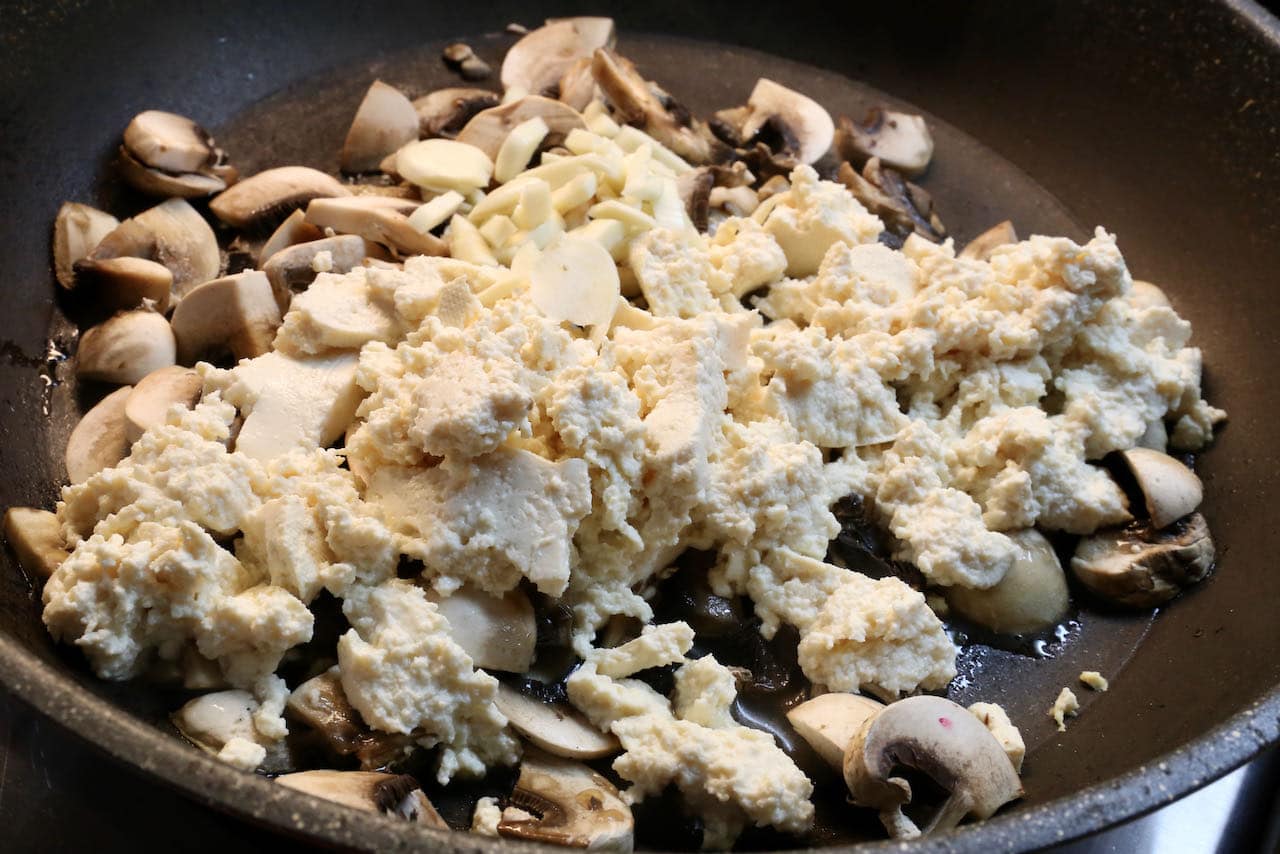 Prepare Vegan Tofu Meatballs in a large nonstick skillet.