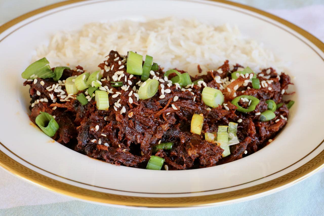 Serve Gochujang Pulled Pork with steamed rice or noodles.