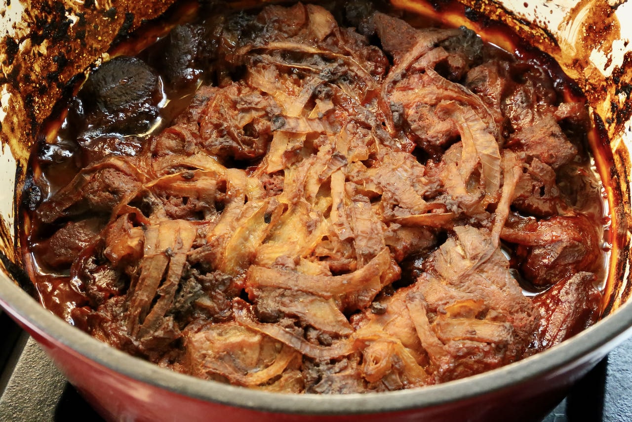 Gochujang Pulled Pork should look like this once it is removed from the oven after roasting. 