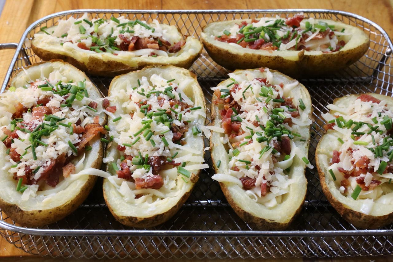 Garnish Air Fryer Potato Skins with scallions or chopped chives before baking.