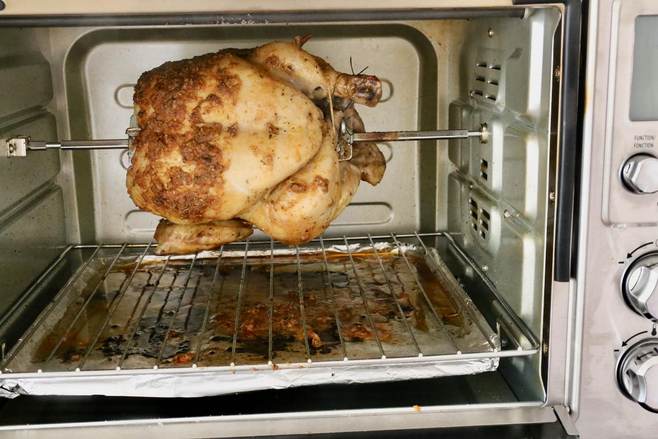 This Hamilton Beach Air Fryer has a built in rotisserie function perfect for roasting a whole chicken. 