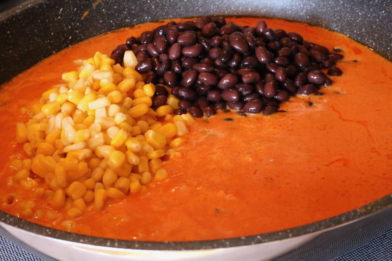 This creamy vegetarian Indian curry is prepared with black beans and sweet corn.