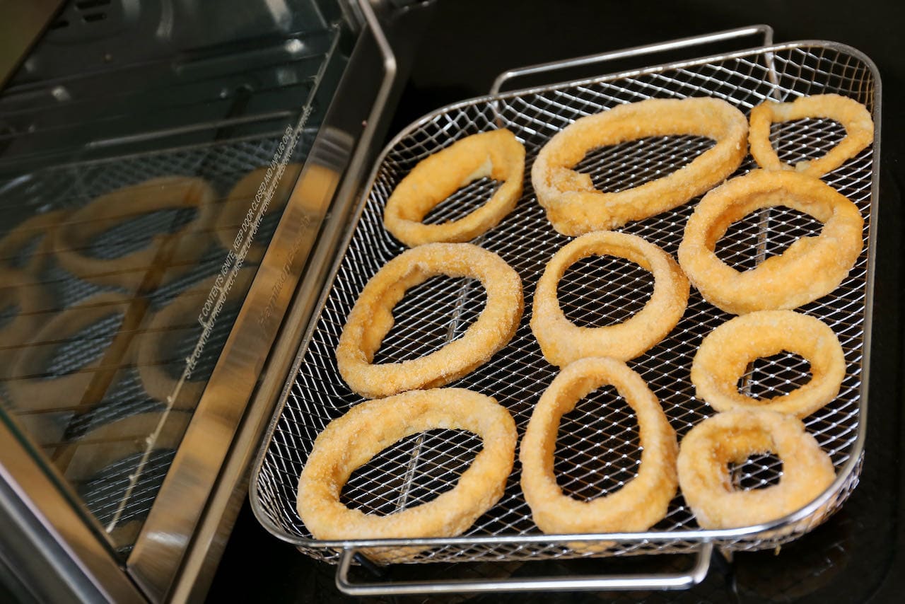 Place frozen onion rings in a single layer in your air fryer basket.