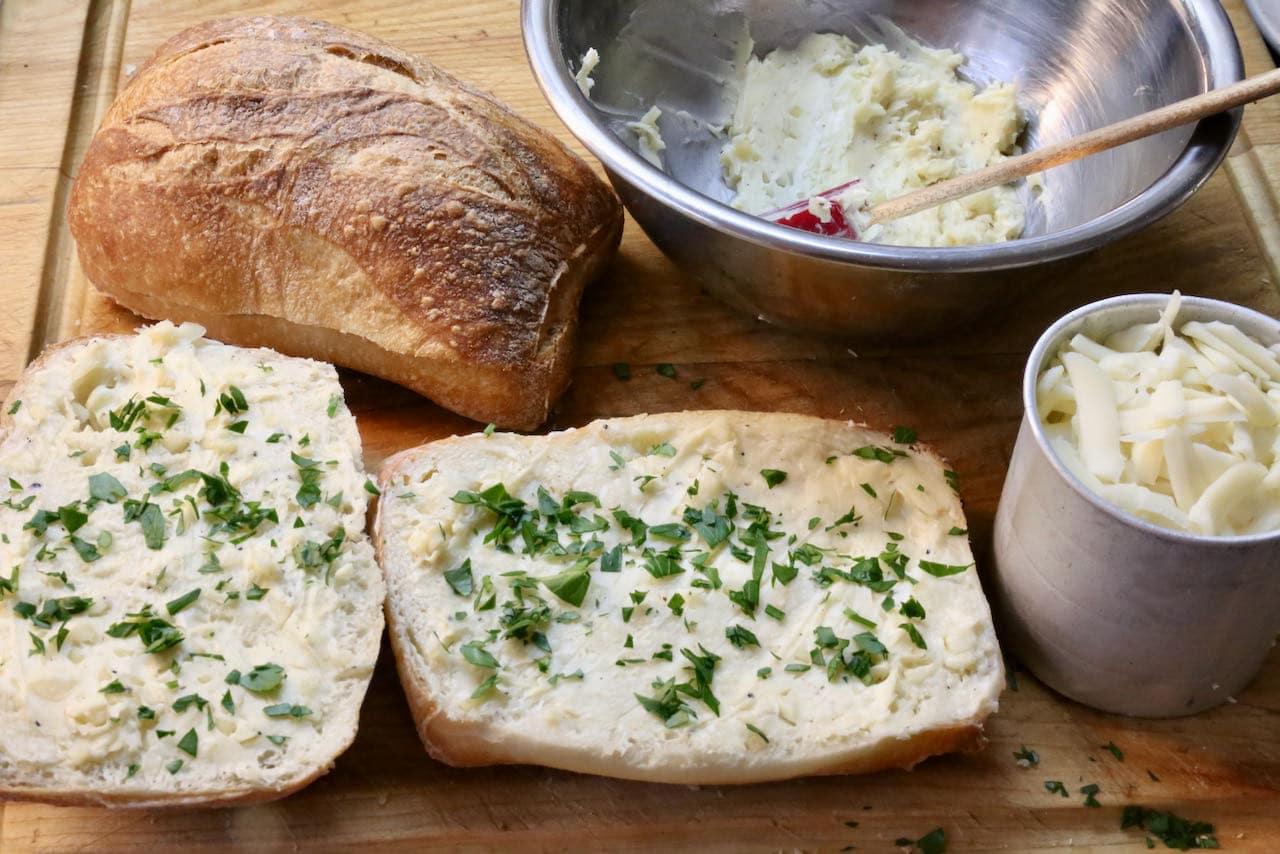 Garlic Bread In Air Fryer: slice ciabatta bread and slathered with butter and chopped parsley.