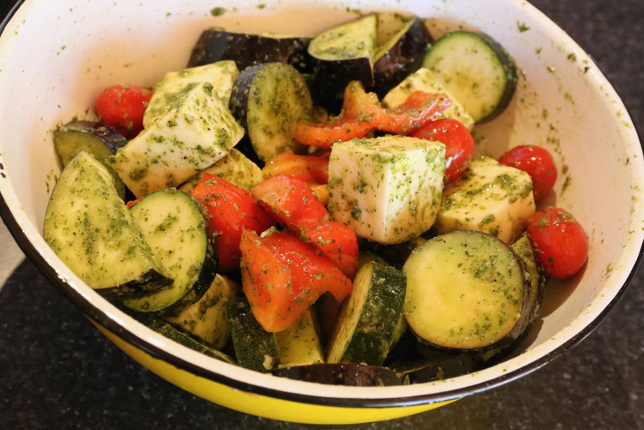 Add zucchini, eggplant, peppers and tomatoes to the mixing bowl and toss to combine.