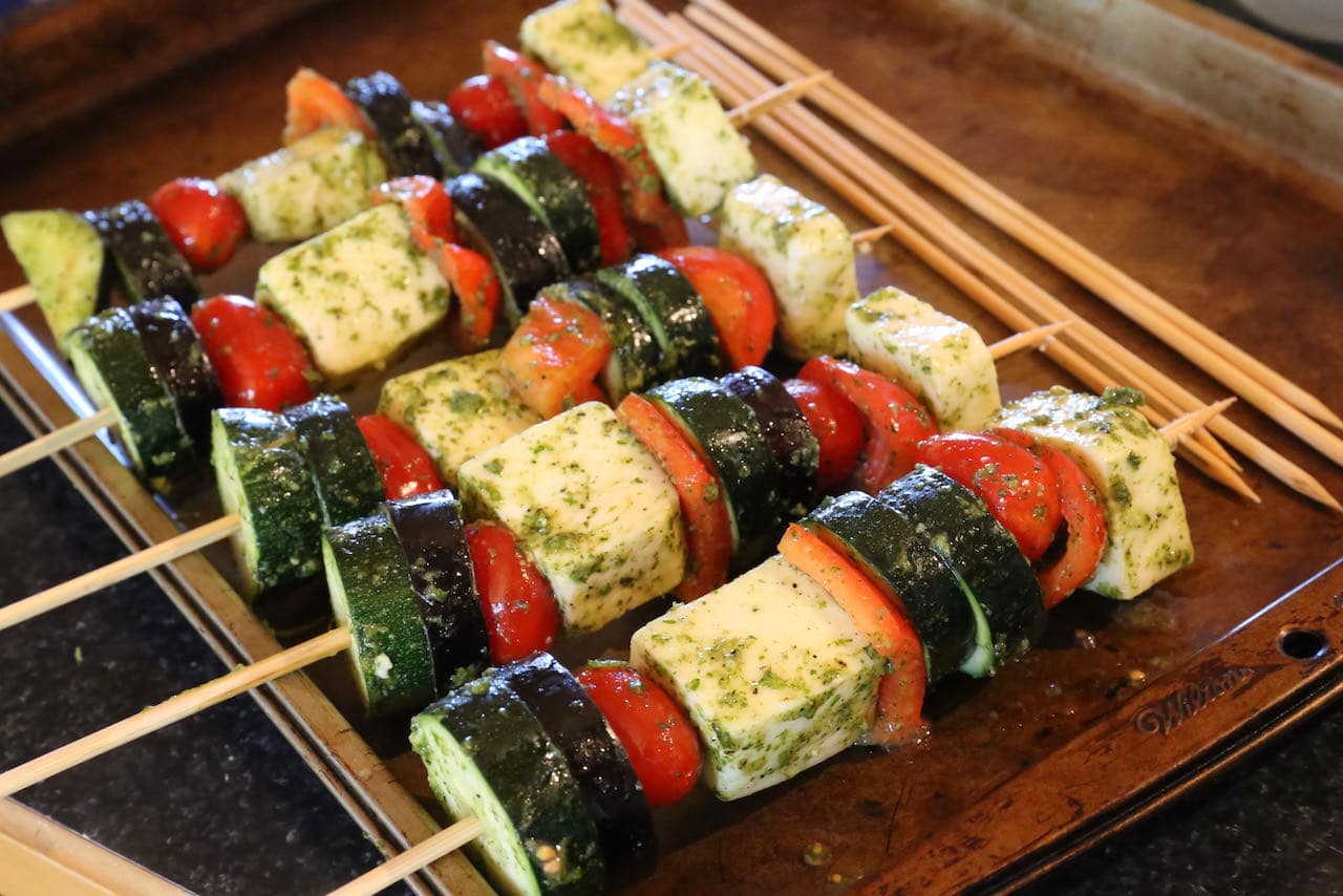Organize Paneer Kebabs on a baking sheet to easily transfer to your BBQ outside.