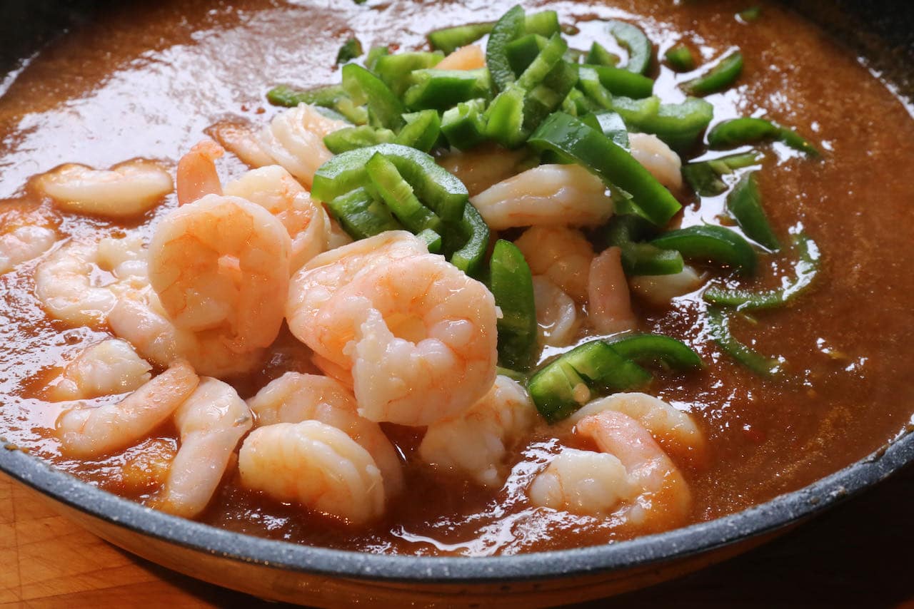 Cook Tamarind Prawn Curry in a large nonstick skillet.
