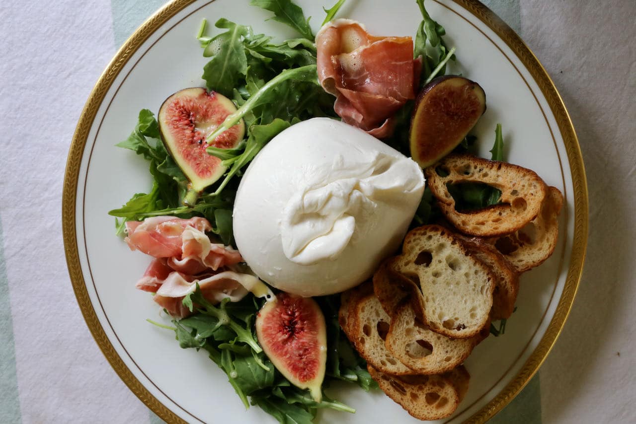 Burrata and Prosciutto is our favourite decadent cheese course to serve at an Italian feast.
