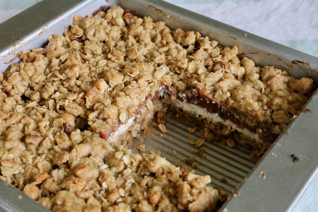 The best Oatmeal Rhubarb Bars features an oat crumble base and topping.