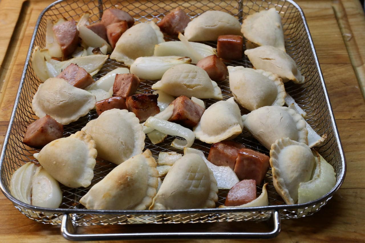 Remove Air Fryer Pierogies once the Polish dumplings are crispy and browned.