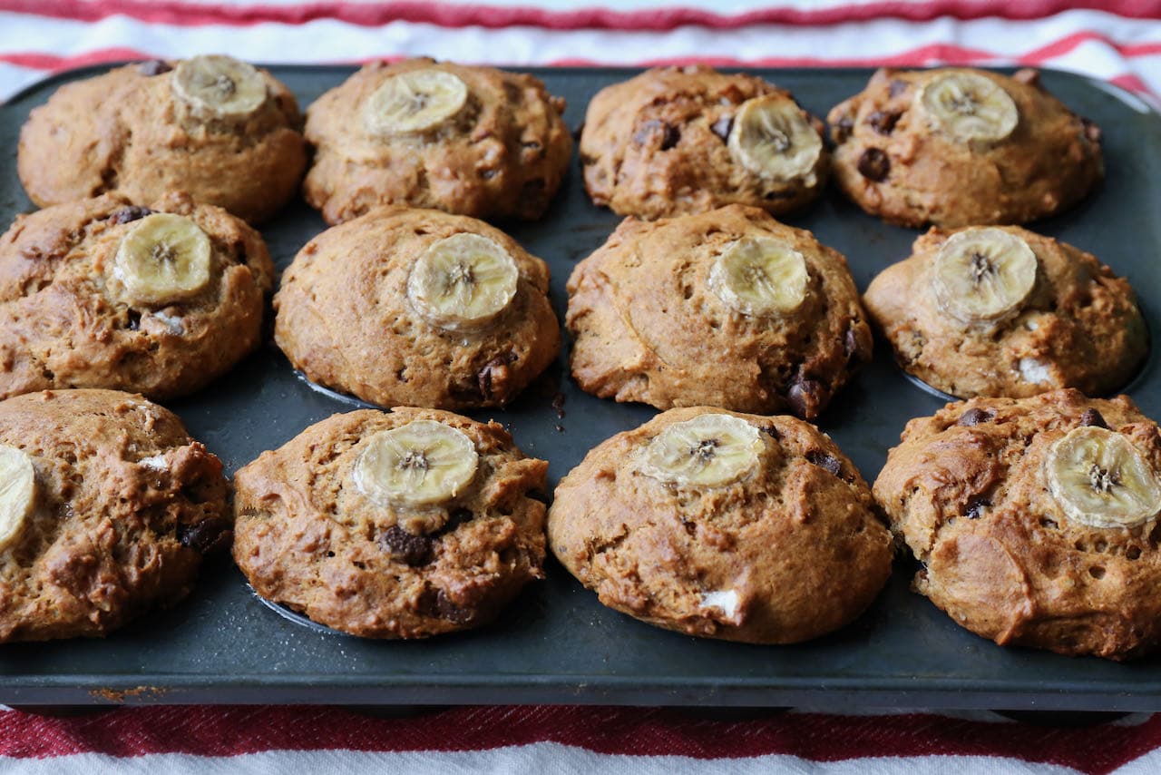 Banana Walnut Chocolate Chip Muffins are finished baking when browned with a crunchy top.