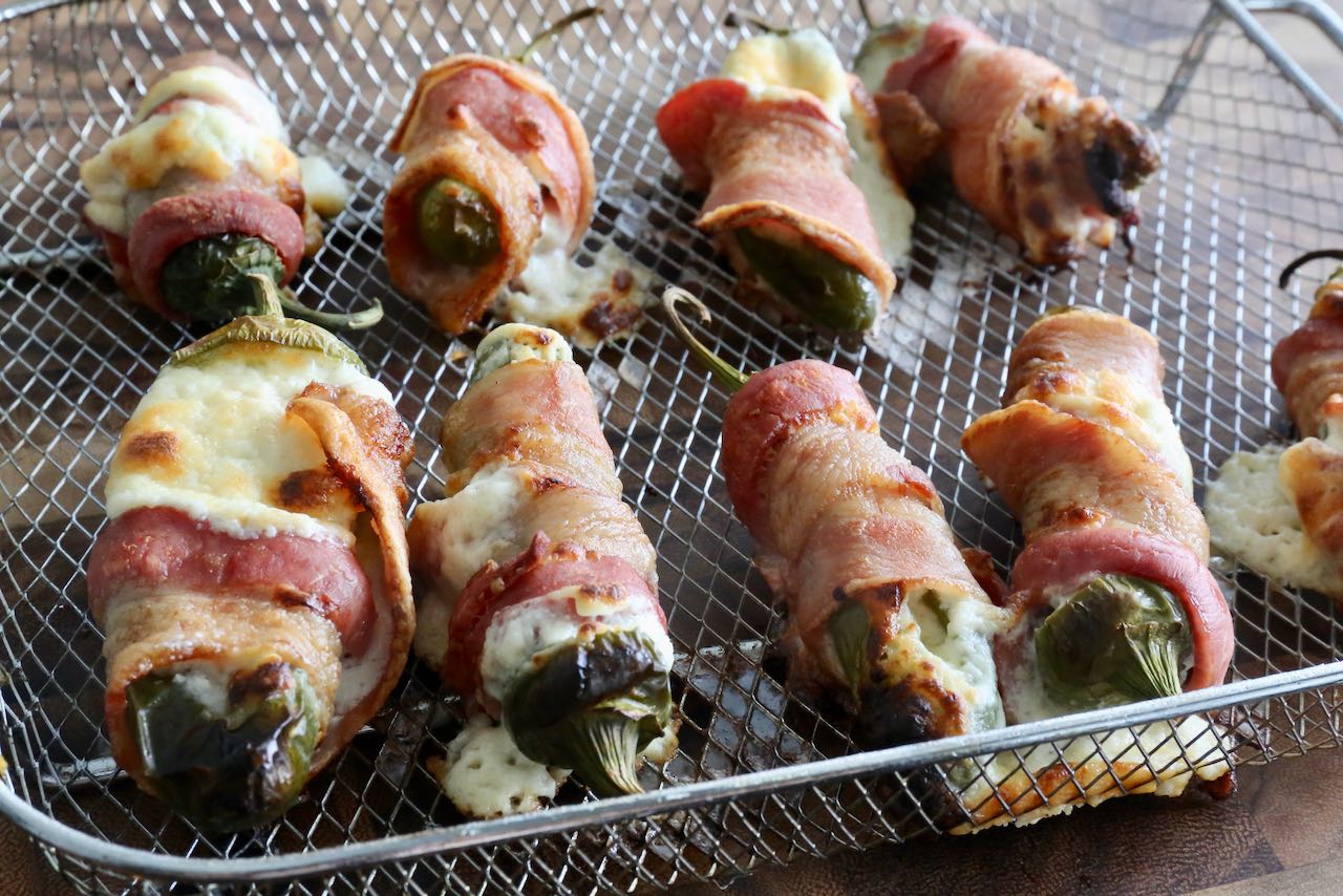 Air Fryer Jalapeno Poppers are finished cooking when the bacon is crispy and cheese filling is melted and bubbling.