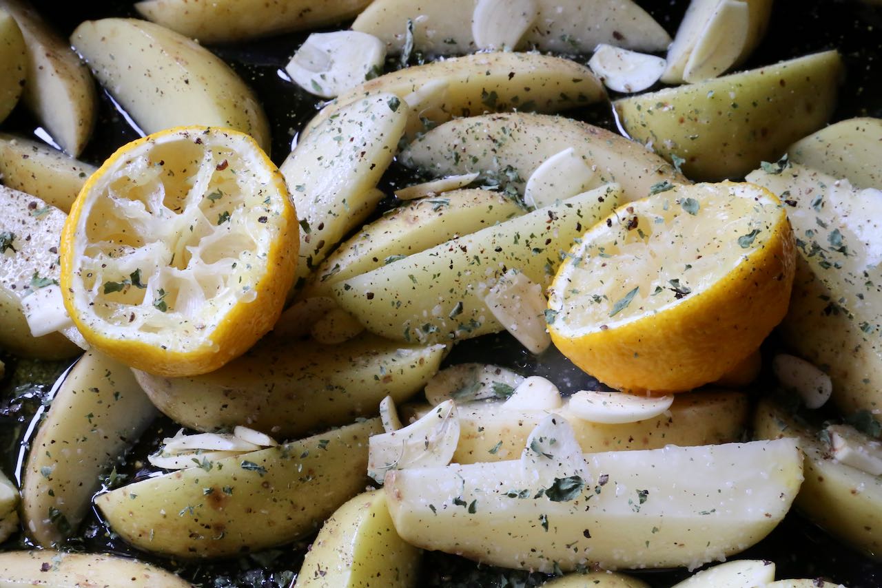 Toss Cyprus Potatoes in oregano, salt, pepper and olive oil before roasting in the oven.