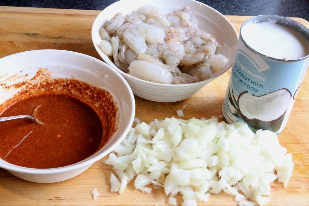 Goan Prawn Curry is prepared with raw shrimp, coconut milk, onion and a fragrant spice paste.