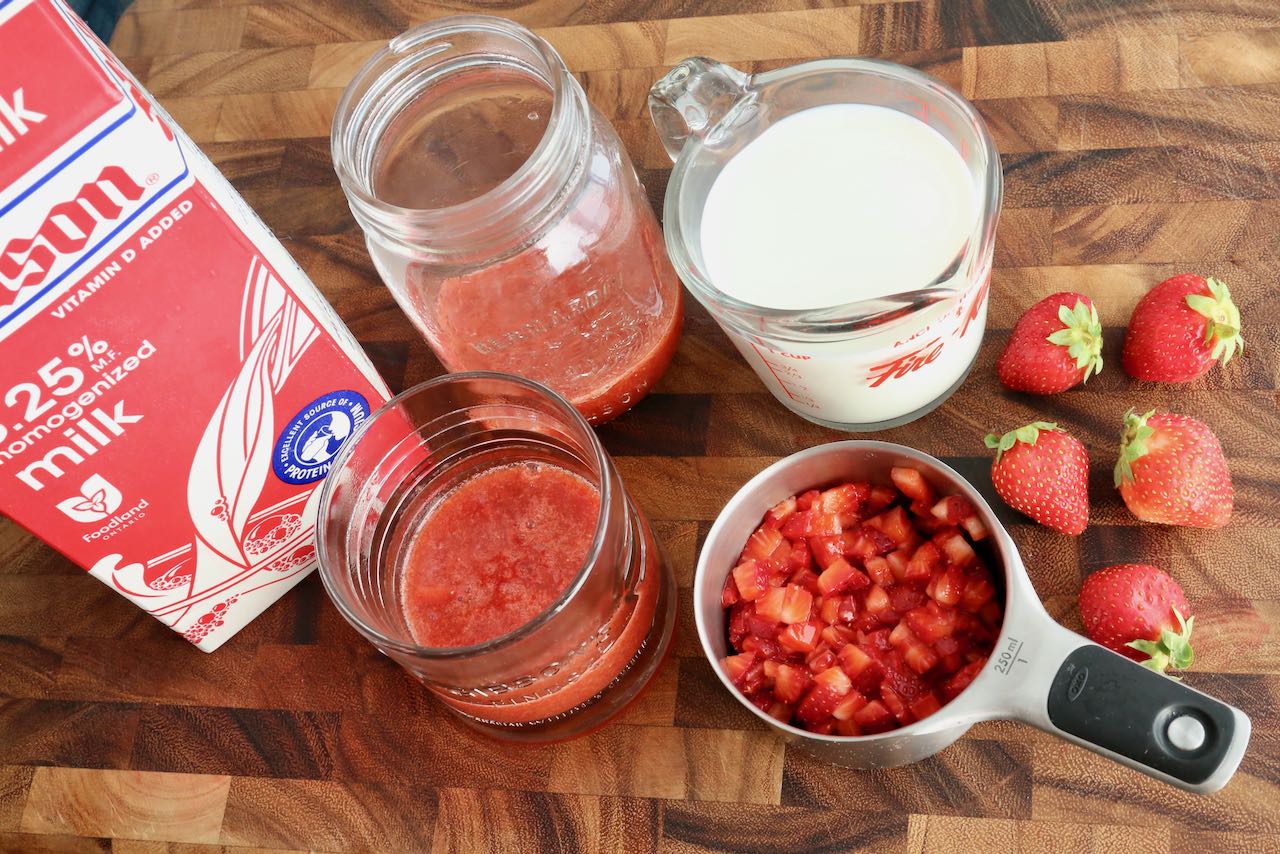 Strawberry Milk Recipe Assembly: whole milk, strawberry syrup & finely chopped fresh strawberries.