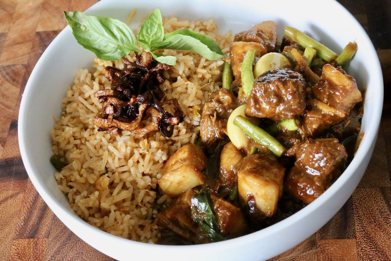 Serve Burmese Pork Curry with rice or roti.