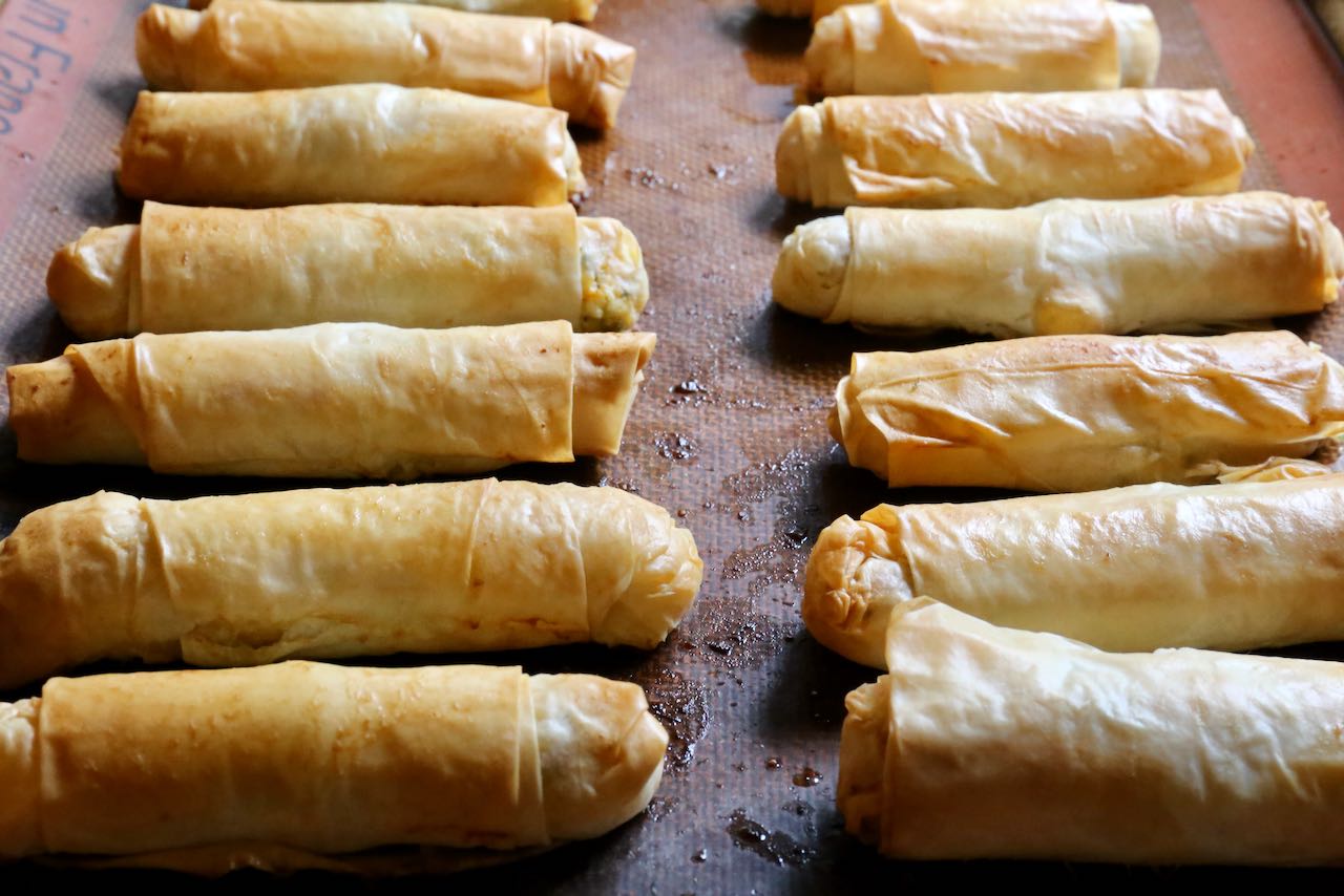 Bake Sigara Börek until the filo pastry is browned and crispy and crunchy. 