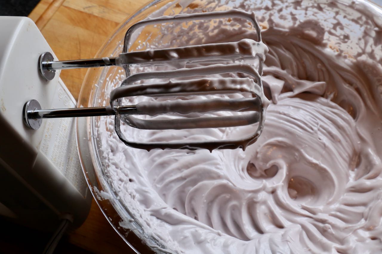 Use egg beaters to make creamy and light Turron de Vino, a Chilean dessert made with red wine and meringue.