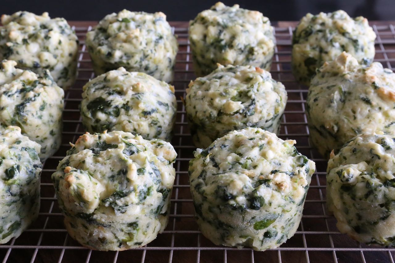 Cool Spinach Feta Muffins on a rack before serving.
