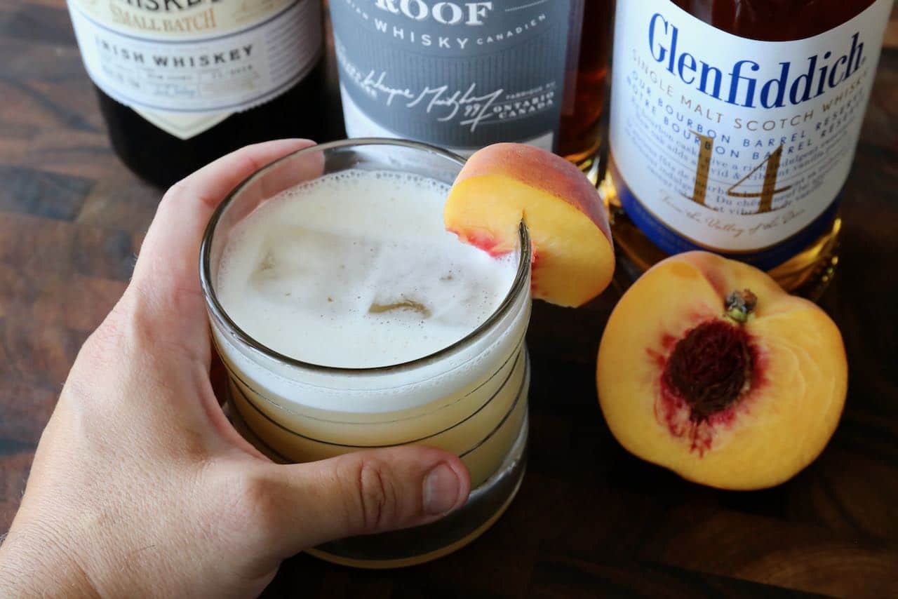 We love serving this Peach Whiskey Sour recipe in the summer when stone fruits are in season.