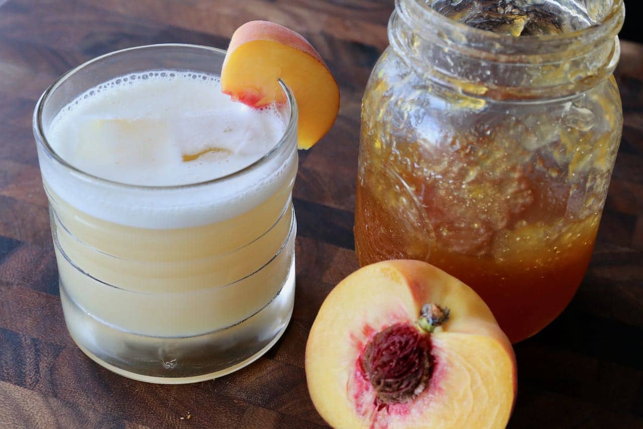 This easy Peach Whiskey Cocktail is flavoured and sweetened with homemade jam or preserves.