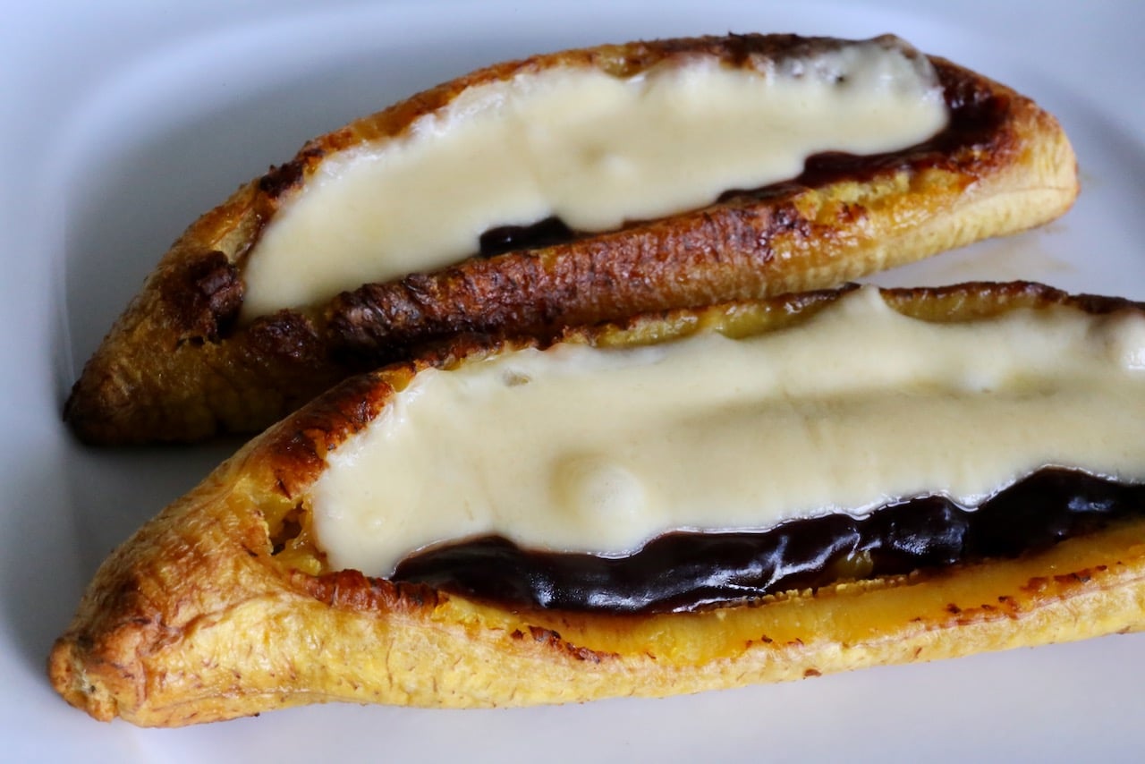 Bake ripe plantains until the cheese has melted.
