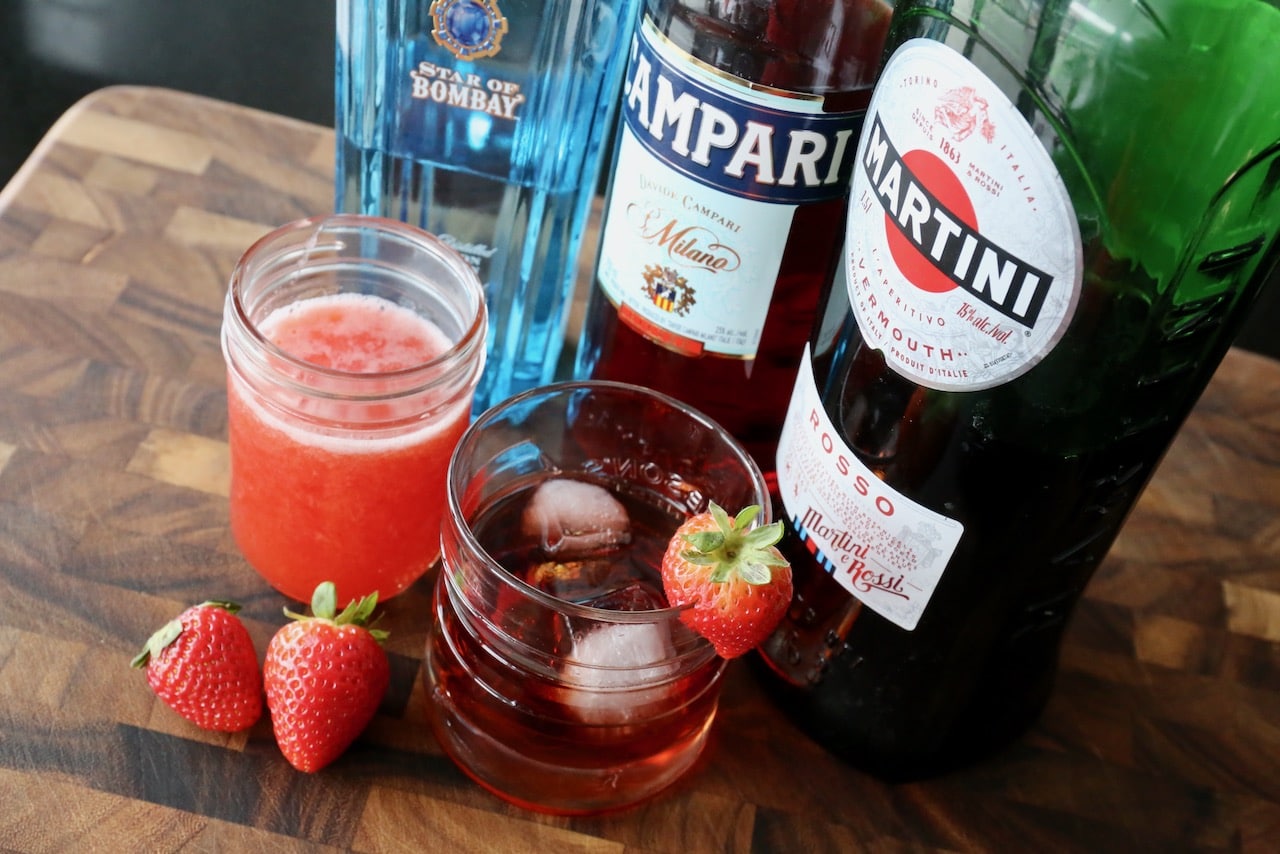 A Strawberry Negroni is a cocktail featuring Campari, red vermouth and gin.