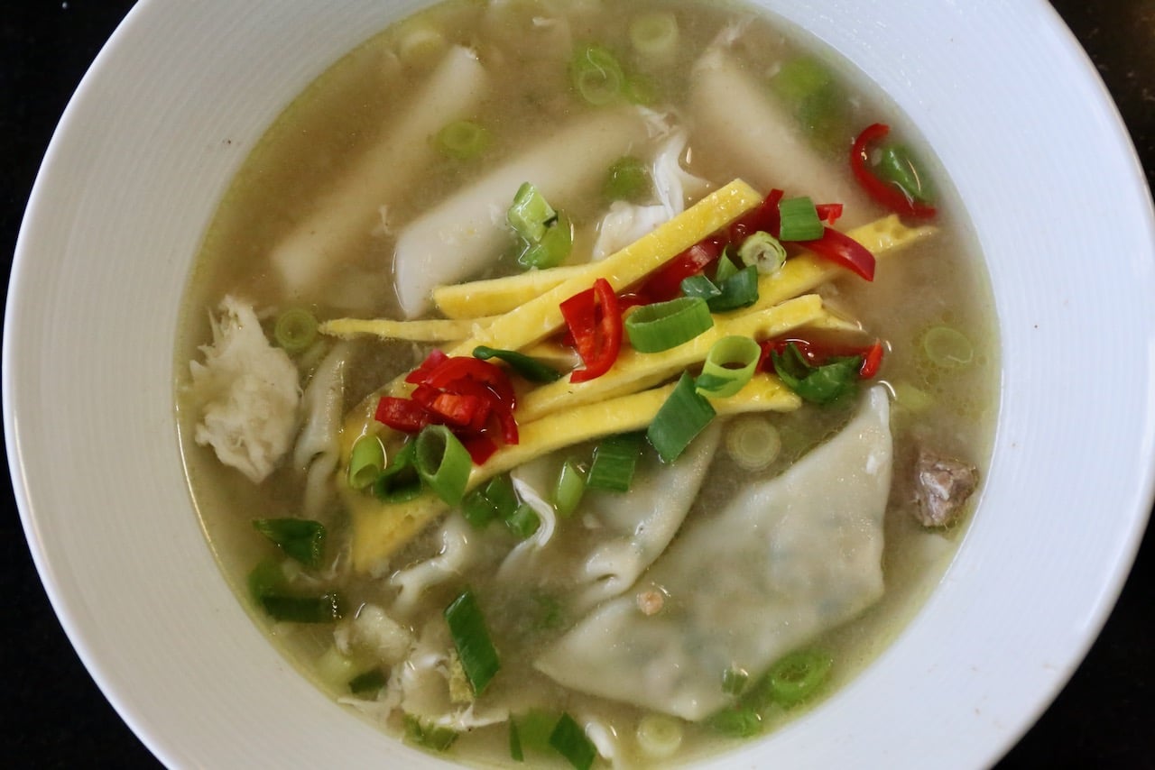 Tteok Mandu Guk is a traditional Korean soup served at New Years.