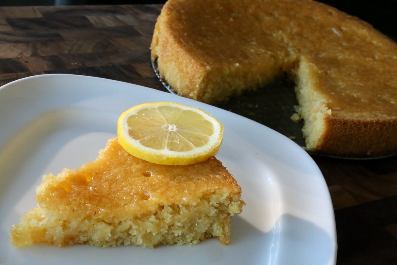 Top each slice of Eggless Lemon Cake with a slice of citrus.