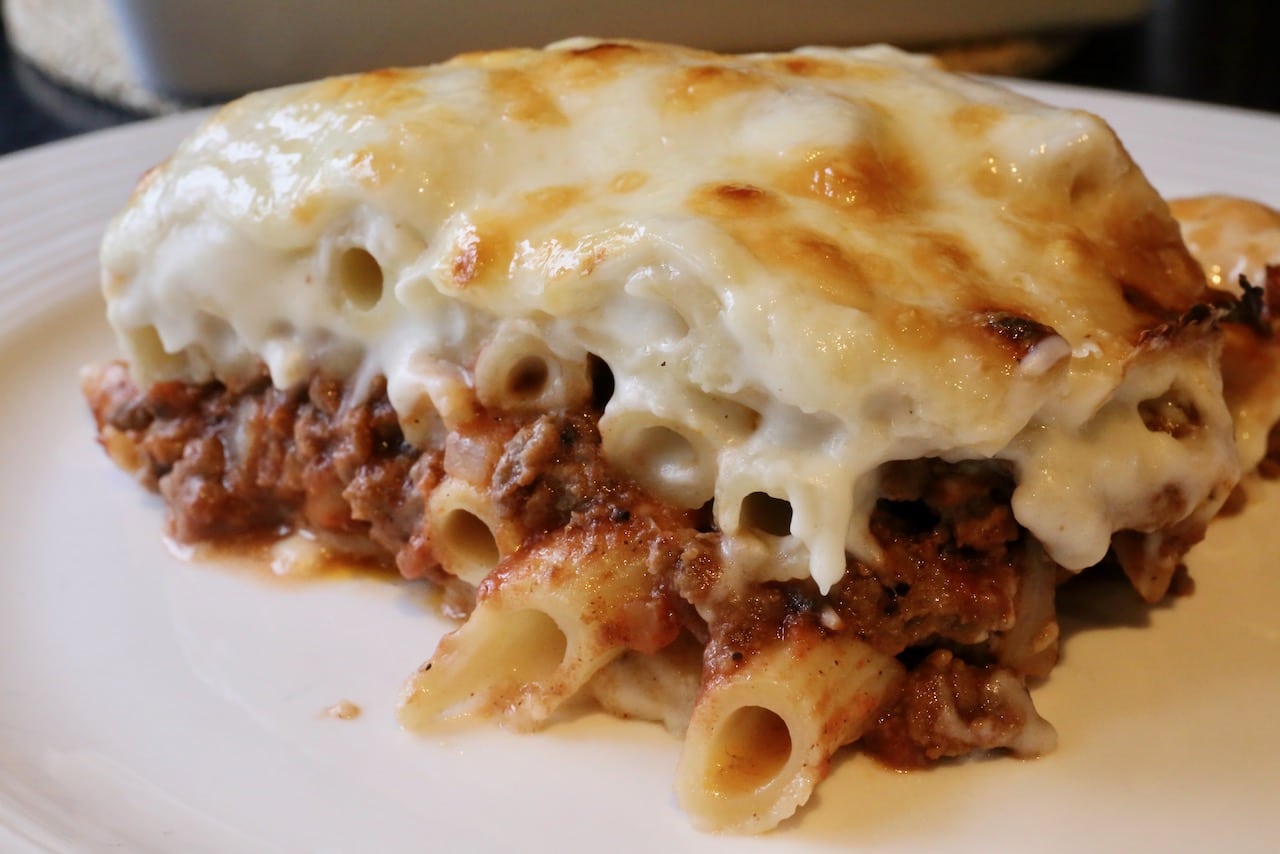 This classic Egyptian comfort food recipe features layers of pasta, spiced beef tomato sauce and creamy béchamel sauce.