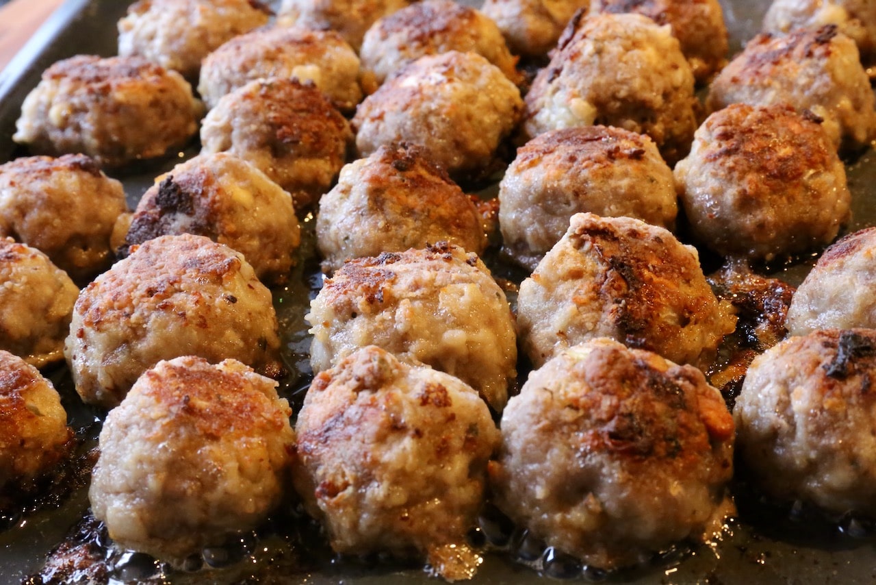 Greek Meatballs are finished roasting once they are browned and crispy on the outside.