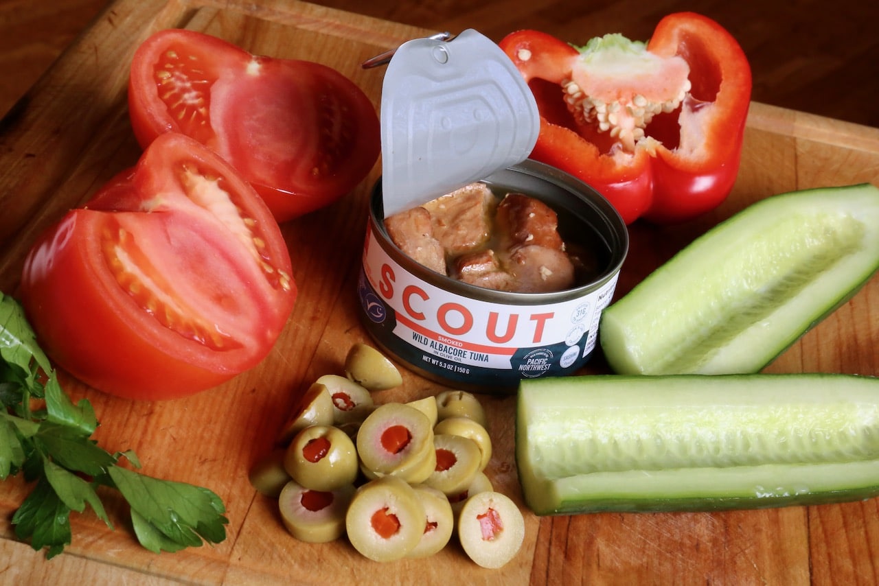 Our easy Pipirrana recipe features Scout Canned Tuna, tomatoes, olives, cucumbers, sweet bell peppers and parsley.