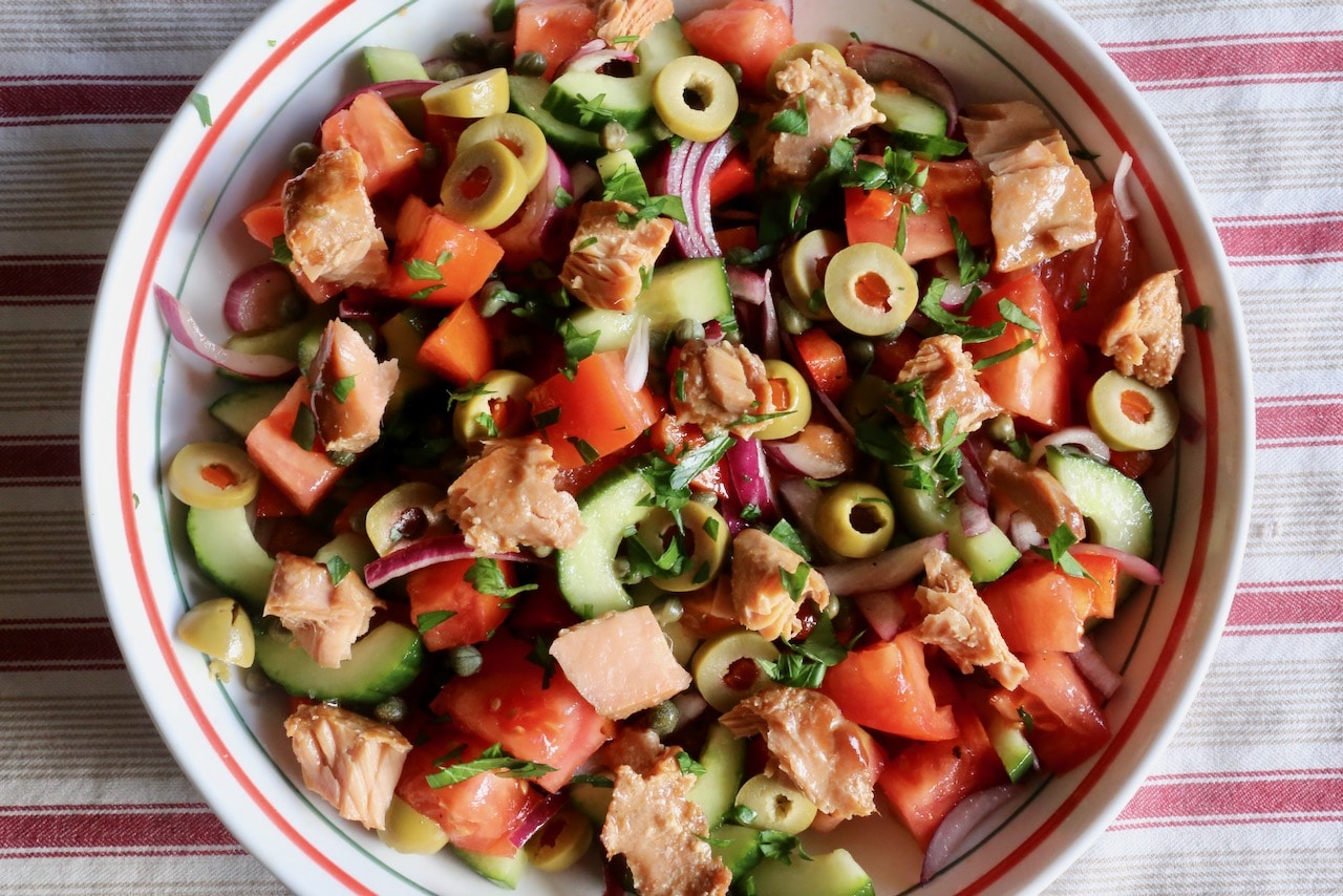 Top salad with chunks of canned tuna before serving.