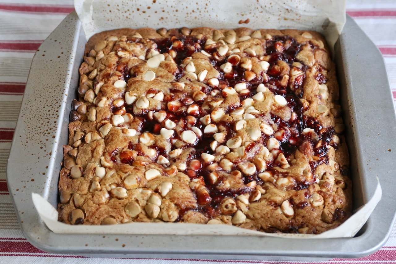 Raspberry Blondies are best paired with decadent white chocolate chips.