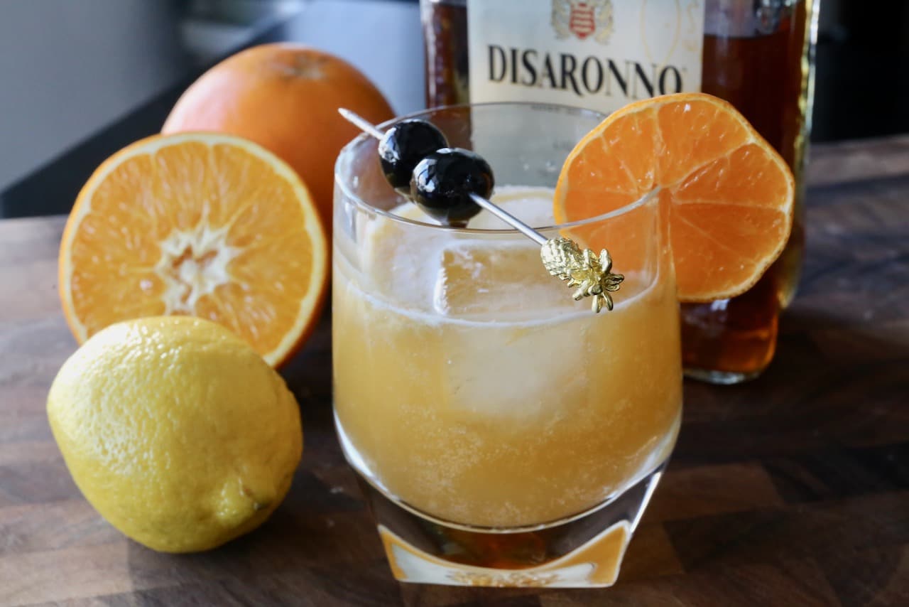 An Amaretto Stone Sour features fresh lemon and orange juice.