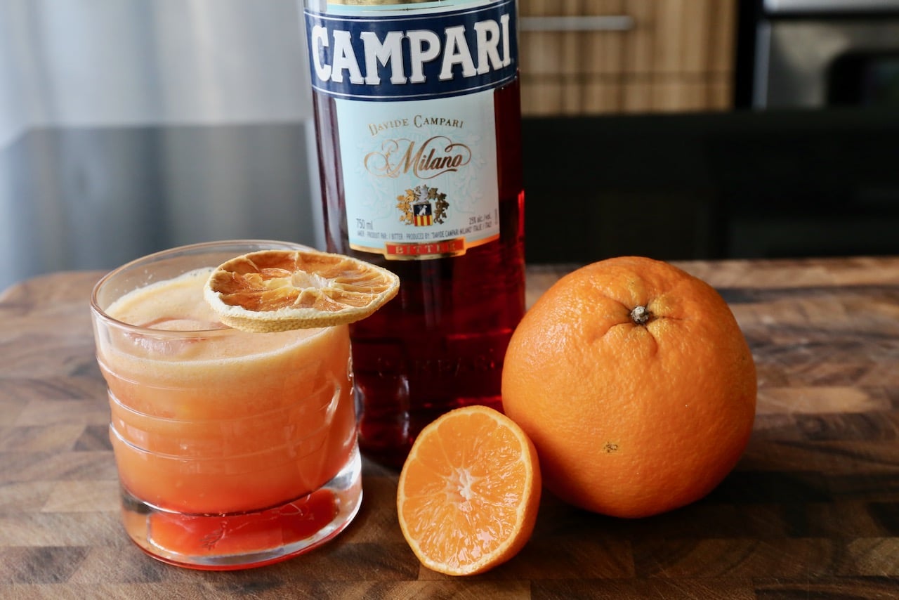 Garnish a Garibaldi drink with dehydrated citrus slices or a fresh orange wheel.