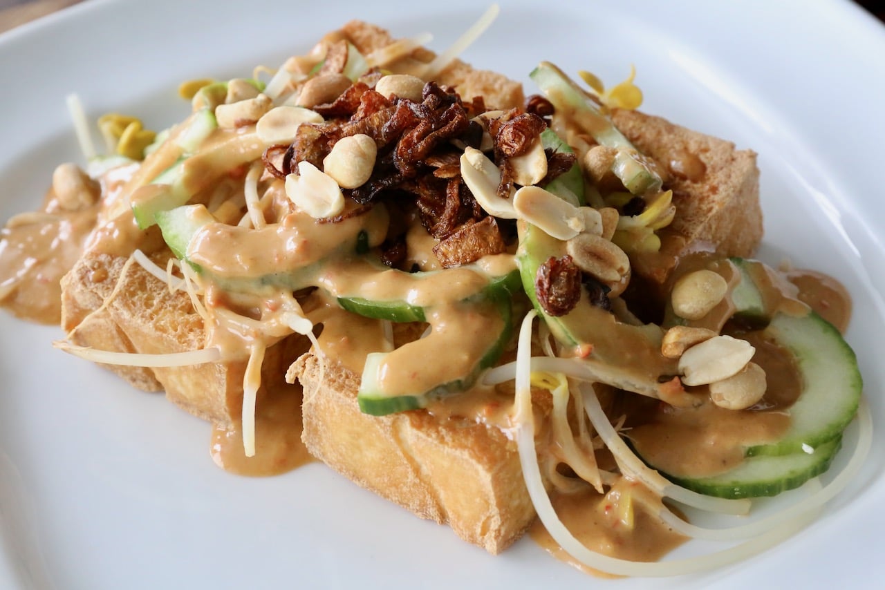 Tahu Goreng features crunchy fried tofu and creamy peanut sauce. 