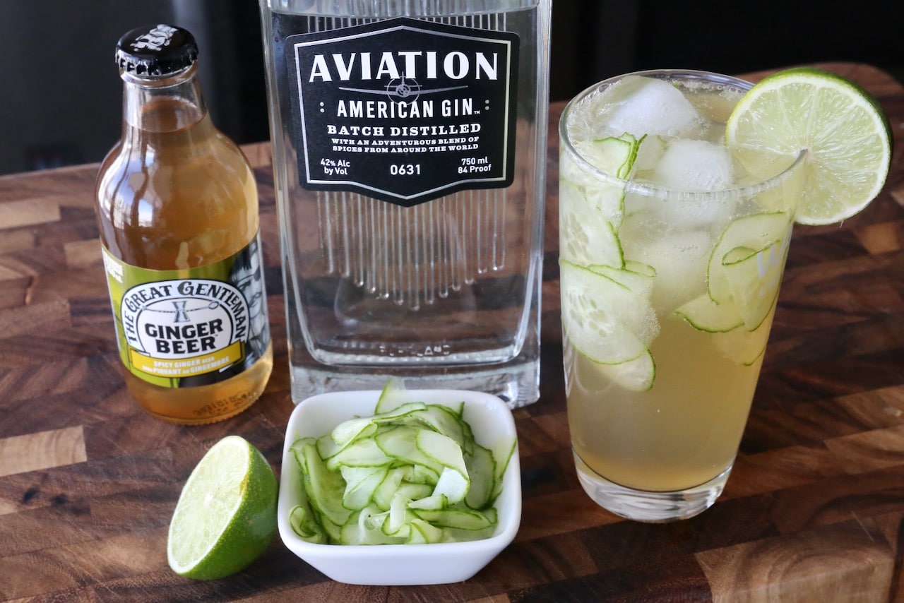 A Munich Mule is a gin cocktail featuring ginger beer, lime and cucumber.  