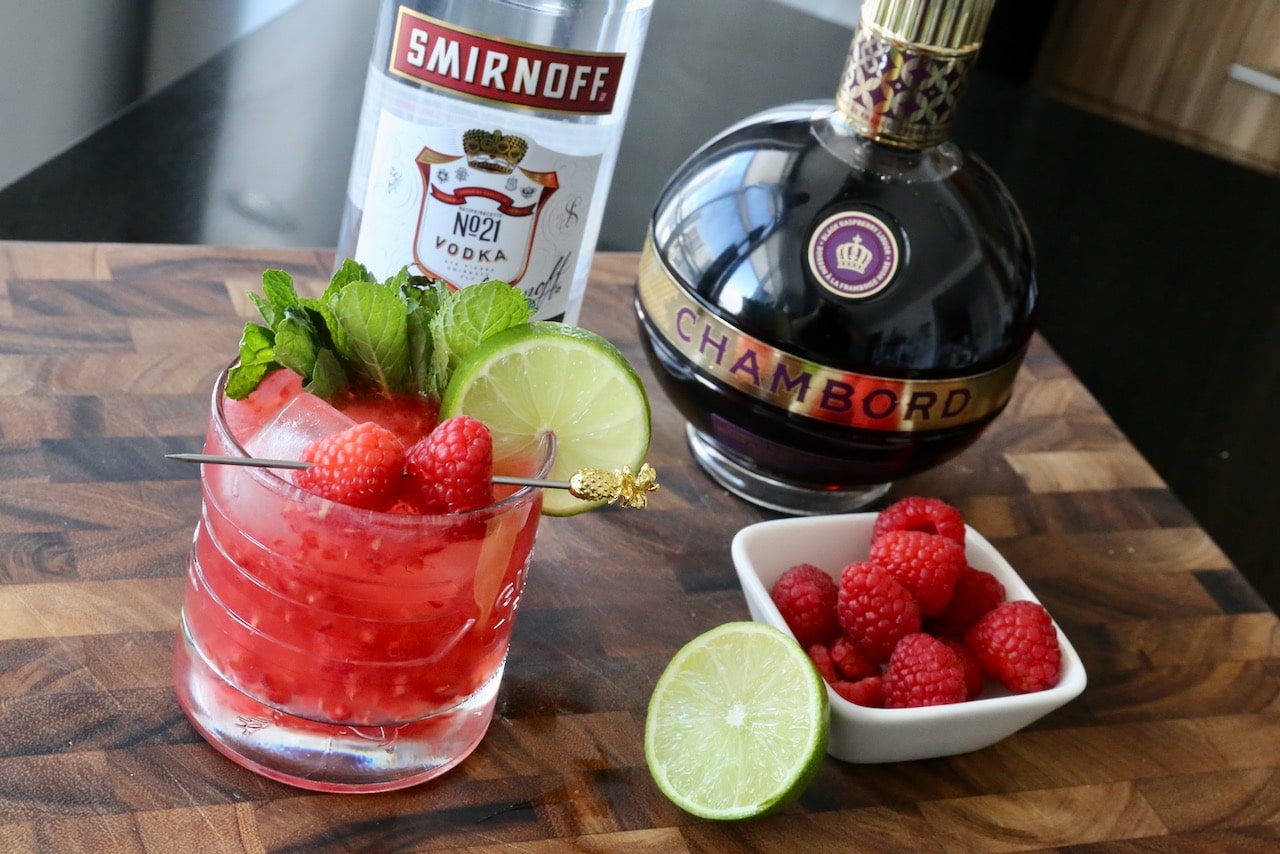This Raspberry Mule recipe features vodka, ginger beer, lime and Chambord raspberry liqueur. 