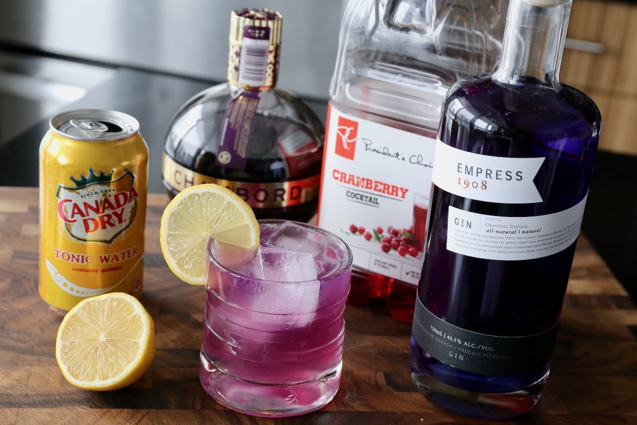 Garnish a Purple Haze Drink with a lemon wheel.