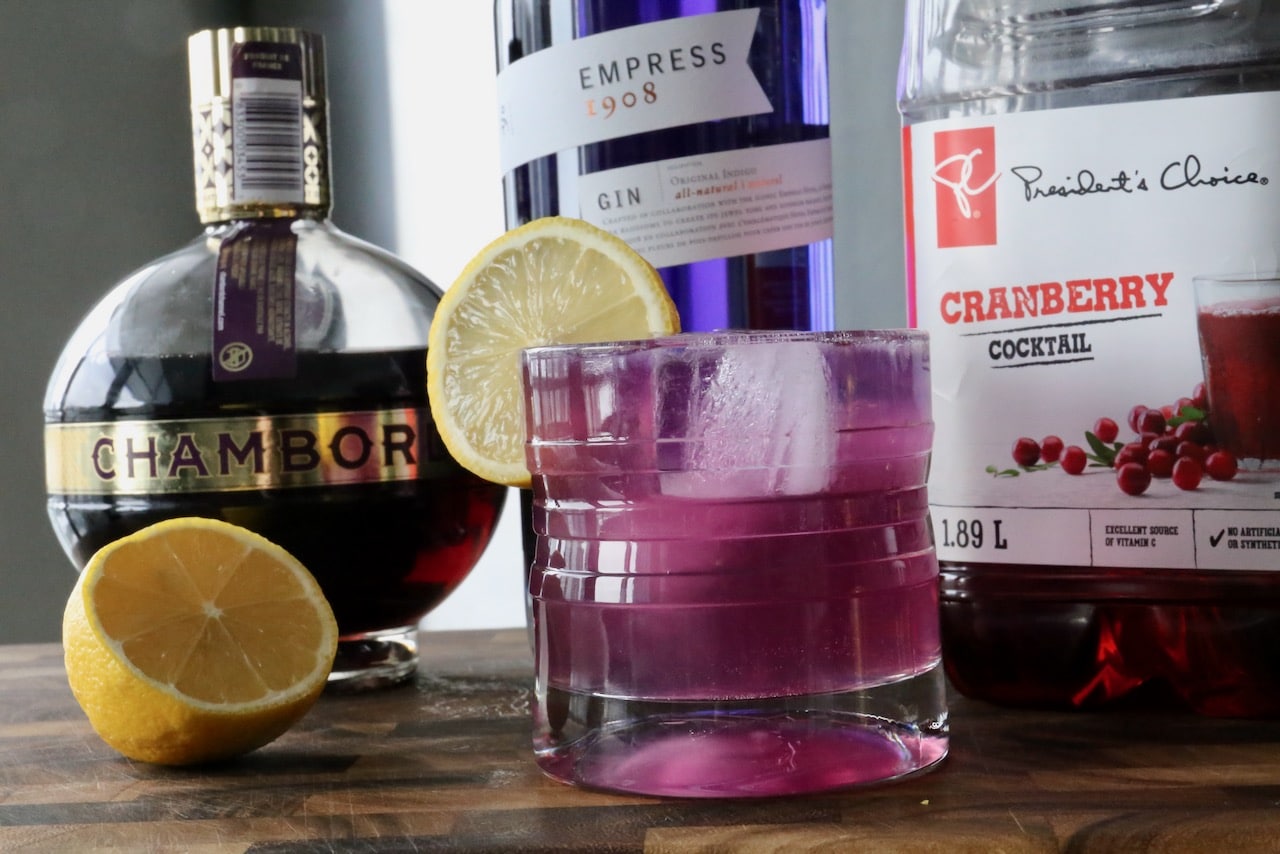 This Purple Cocktail features Empress Gin, Chambord and cranberry juice.