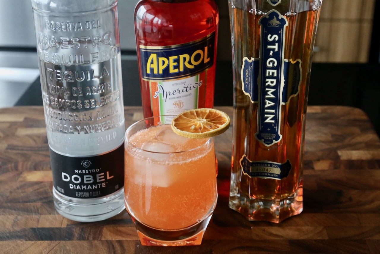Serve this Tequila Aperol Cocktail in a rocks glass garnished with a dehydrated citrus wheel.